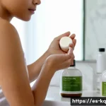 비건 화장품으로 인한 알레르기 대처법 - A detailed close-up portrait of a young woman with sensitive skin applying a vegan cosmetic cream, w...